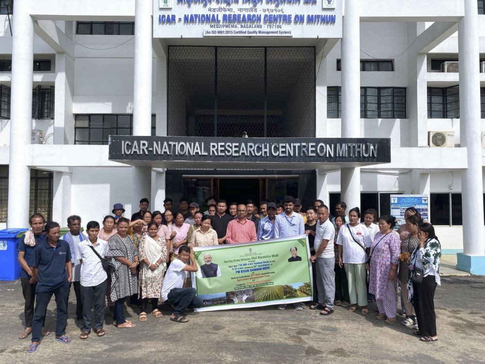Farmers and ICAR-NRC on Mithun staff at the PM-KISAN Utsav Diwas event in Medziphema.